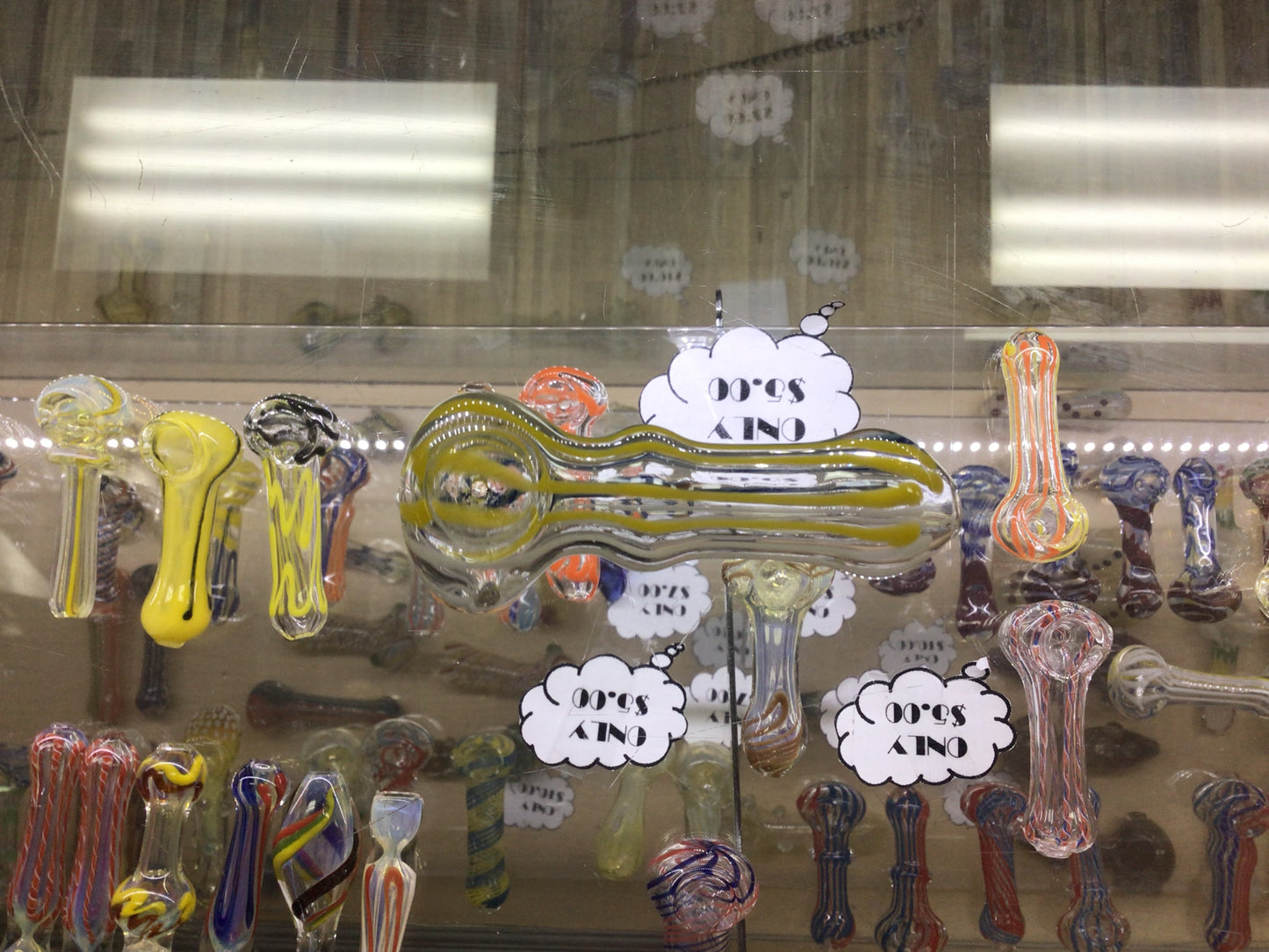 Hand pipe- yellow, white, and blue